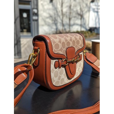 Жіноча сумка Coach коричневий моногам Коуч
