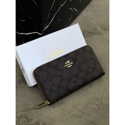 Жіночий гаманець Coach коричневий на багато відділень великий Коуч
