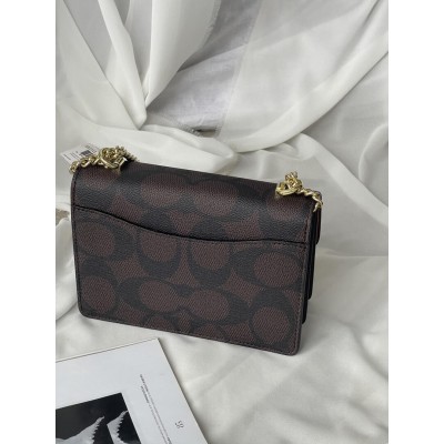 Сумка жіноча Coach Mini Klare Crossbody in Signature Canvas через плече темно - коричневий Коуч