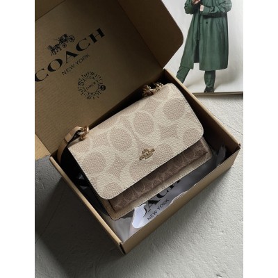 Сумка жіноча Coach Mini Klare Crossbody in Signature Canvas через плече молочний Коуч Сумка жіноча Coach Mini Klare Crossbody in Signature Canvas через плече молочний Коуч