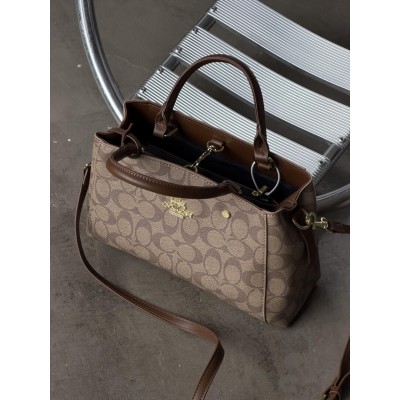 Жіноча сумка Coach через плече бежевий крос боді