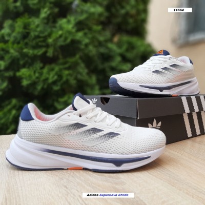 Adidas Supernova Stride белые с синим и оранжевым. Размер 41
