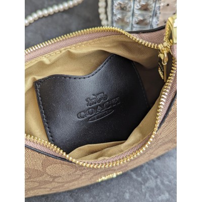 Жіноча сумка багет Coach Kleo бежевий через плече Коуч
