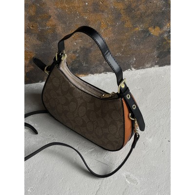 Жіноча сумка багет Coach Kleo бежевий через плече Коуч