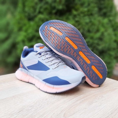 Reebok сірі з синім з помаранчевим, Розмір 42