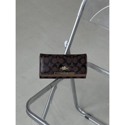 Жіночий гаманець Coach коричневий подвійний великий Коуч