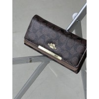 Жіночий гаманець Coach коричневий подвійний великий Коуч