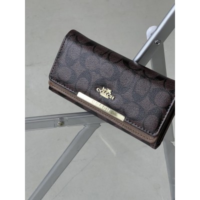 Жіночий гаманець Coach коричневий подвійний великий Коуч Жіночий гаманець Coach коричневий подвійний великий Коуч
