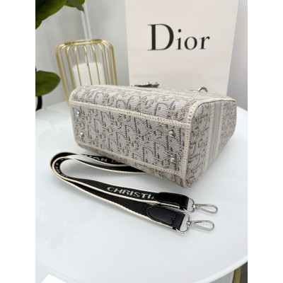 Женская сумка клатч Кристиан Диор молочная с текстильными ручками Dior